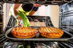 Cooking in the oven at home.