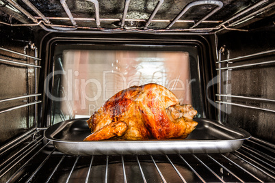 Roast chicken in the oven.