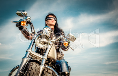 Biker girl on a motorcycle