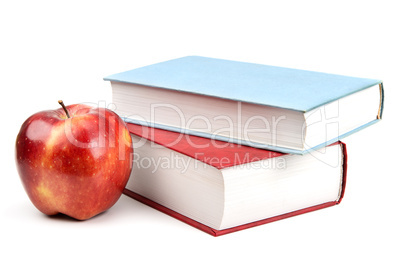 books and red apple