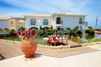 Villas decorated with flowers at luxury hotel, Crete, Greece