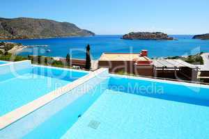 Swimming pool at luxury hotel with a view on Spinalonga Island,