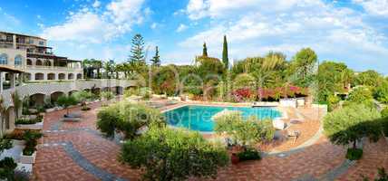 The panorama of swimming pool at luxury hotel, Crete, Greece