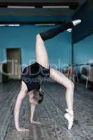 Young ballet dancer practising in the studio