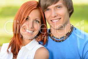 Teenage couple in love smiling sunny day