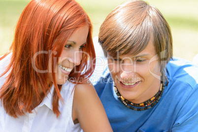 Teenage girl looking at her boyfriend summer