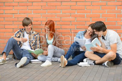 Group of students with books hanging out