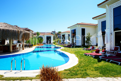 Modern villas with swimming pool at luxury hotel, Antalya, Turke