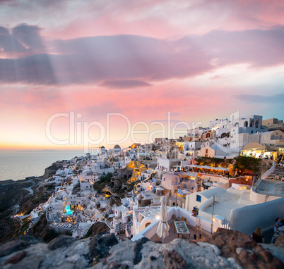 Mediterranean village of Oia at dusk, Santorini Island - Greece