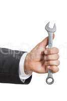 Business man hand with wrench