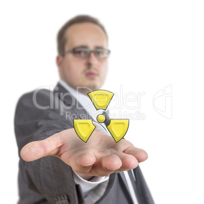 Business man holding radioactive Symbol