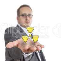 Business man holding radioactive Symbol