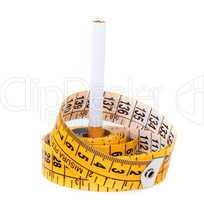 Measuring tape and cigarette