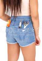 Girl in shorts with tools.