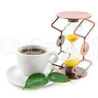 tea cup and hourglass isolated on white background