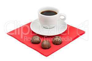 cup of coffee and chocolate candy
