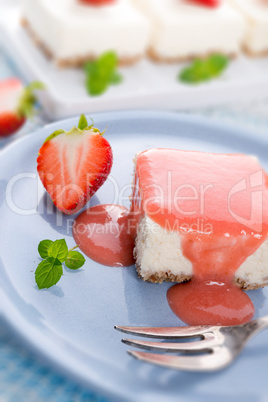 Cheese cake with strawberry sauce