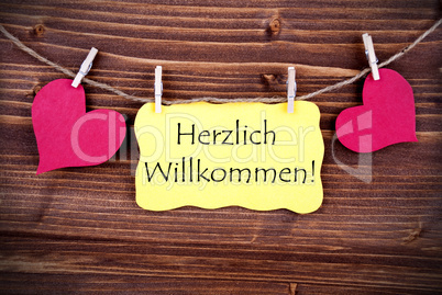 Yellow Label with Herzlich Willkommen