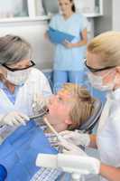 Dentist nurse dental treatment teenager patient