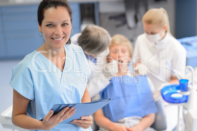 Professional dentist  team checkup teenage patient