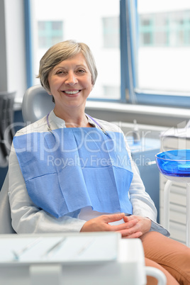Elderly woman patient at dental surgery checkup