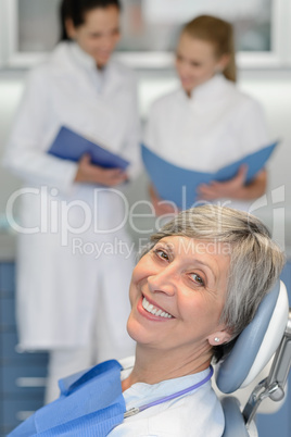 Senior woman patient at dentist surgery smiling