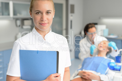 Dental assistant dentist checkup woman patient