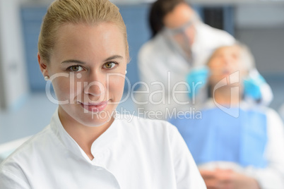 Dental assistant closeup dentist checkup patient