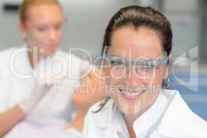 Professional dentist protective glasses patient checkup