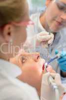Professional dental team checkup patient woman