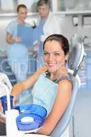 Woman patient sitting chair dental surgery checkup