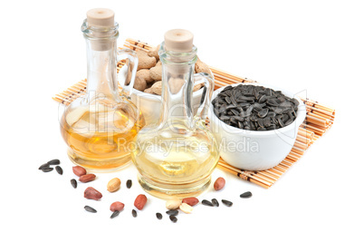 Sunflower seeds, peanuts and bottle of oil