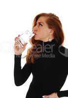 Woman drinking water.