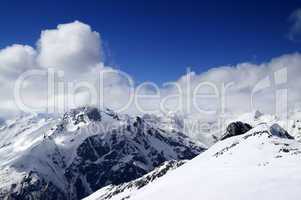 Ski slope at sun day