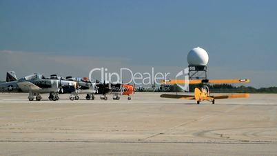 BOEING PT-17 STEARMAN and FAIRCHILD CORNELL Rolling to the start for demonstration flight.