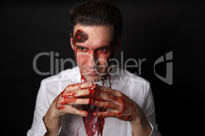 Psychopath with bloody hands