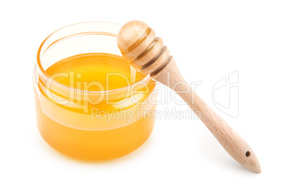 pot with honey and drizzler