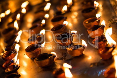 Burning candles in the Indian temple.