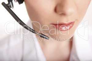 Closeup of a business woman with headset