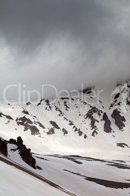 Snowy mountains in fog