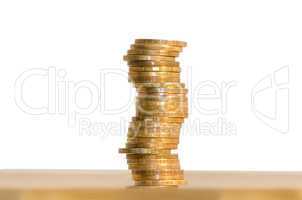 A stack of coins, isolated on white background