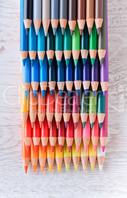 Colour pencils on white table