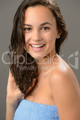 Teenage girl wet hair care smiling brunette