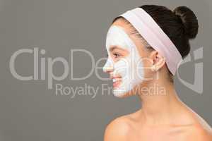 Teenage girl cosmetics mask beauty looking away