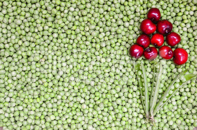 Cherries and peas background