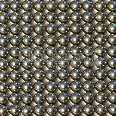 background of small metal balls on a light background