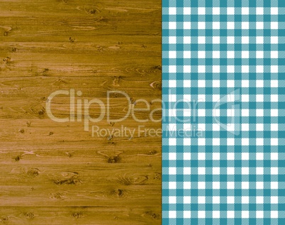 Traditioneller Hintergrund - Holz mit blau-weißer Tischdecke