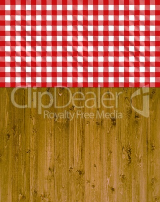 Traditioneller Hintergrund - Holz mit rot-weißer Tischdecke