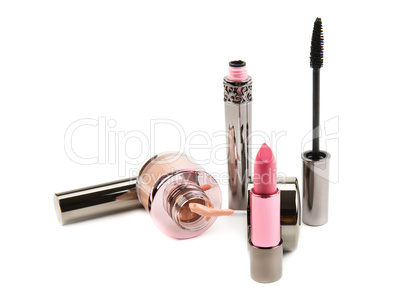 lipstick mascara and cream powder on a white background