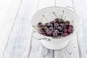 Fresh Cherries in a Sieve